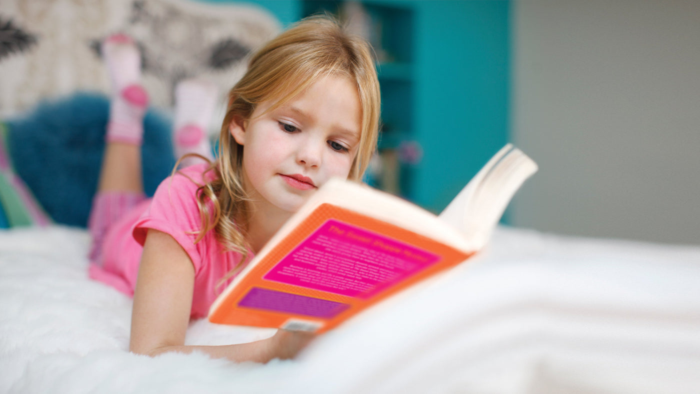 Muñecas con libro